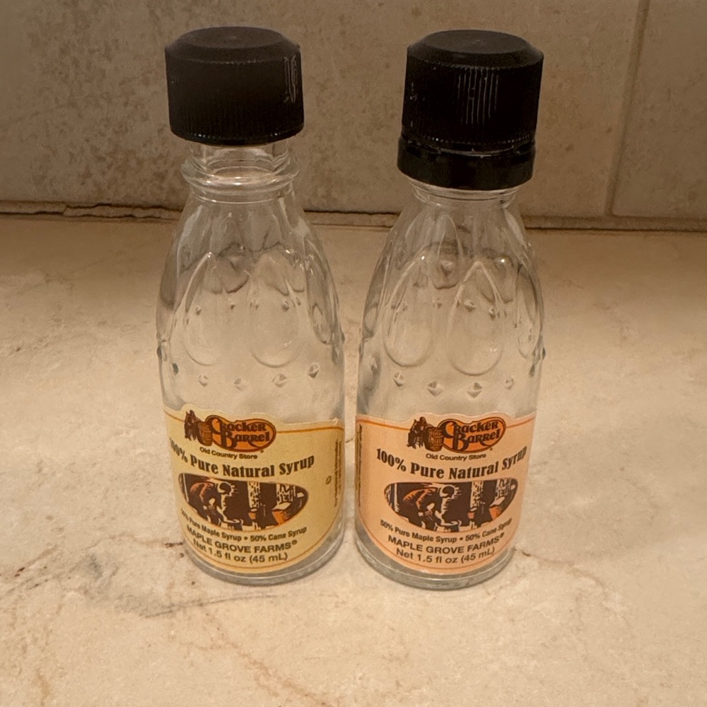Clear Glass Bottles with Black Caps